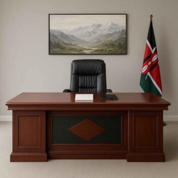 Spacious 2M executive office desk in rich mahogany veneer with black accent panels and polished surface, ideal for CEO office setups in Nairobi