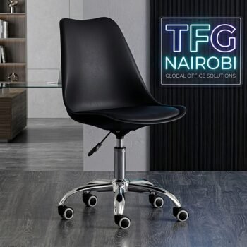 A sleek black EO1300B Eames Office Chair ergonomic office chair with a chrome swivel base in a modern home office setting on Ngong Road, Nairobi.