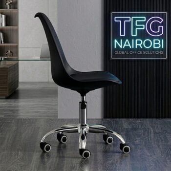 Side profile of the EO1300B Eames-style office chair showing the ergonomic curved backrest and chrome swivel base in a modern Ngong Road home office.