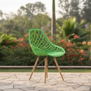 Green EO197G Eames chair with beech wood legs photographed in the diplomatic suburb of Gigiri.