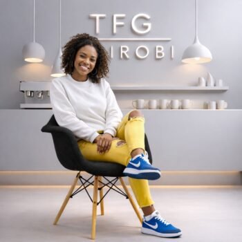 EO8418 Black Eames fabric armchair with wooden legs and upholstered shell in a luxury Loresho Nairobi residential interior.