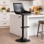 Height adjustable JH296 black quilted PU leather kitchen island stool with a 360-degree swivel and black chrome pedestal in a Kilimani home.