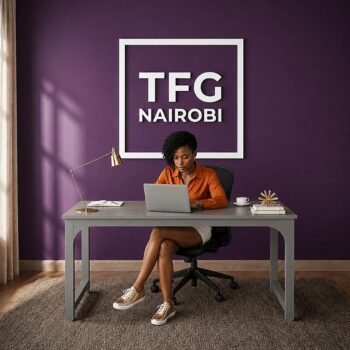 Client working on laptop at TFG VM1.6M grey computer table in a modern workspace on Gatundu Road, Nairobi, Kenya