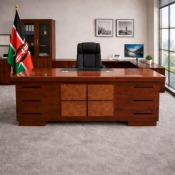 1.4m executive office desk in a prestigious Westlands law firm featuring a glossy red-brown veneer finish.