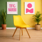 Vibrant yellow EO1300YM Eames chair with natural wooden legs in a stylish Karen home, Nairobi.