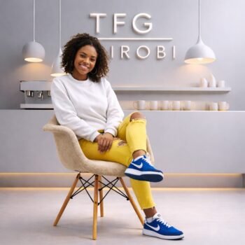 EO8418 Beige Eames fabric armchair with wooden legs and upholstered shell in a luxury Westlands Nairobi executive home office.