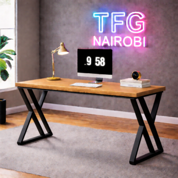 Executive STUDIO C BLOK400 computer desk featuring a natural oak wooden top and architectural black X-frame metal legs in a luxury Ineza, Runda home office, Nairobi.