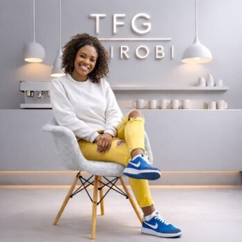 EO8418 Gray Eames fabric armchair with wooden legs and upholstered shell in a luxury Kitisuru Nairobi home interior.