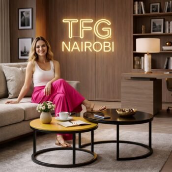 Happy customer enjoying coffee at a luxury Muthaiga apartment featuring the FCT0803 nesting coffee tables by TFG Nairobi.