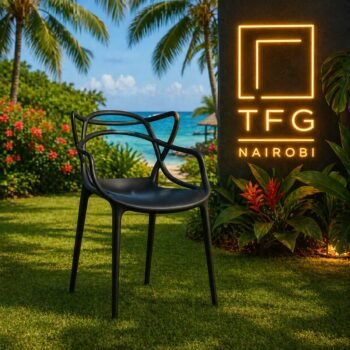 A modern NARDI BC187-B Plastic Chair black fiberglass resin plastic chair with an ergonomic branch-like backrest in a luxury garden setting in Kileleshwa, Nairobi.