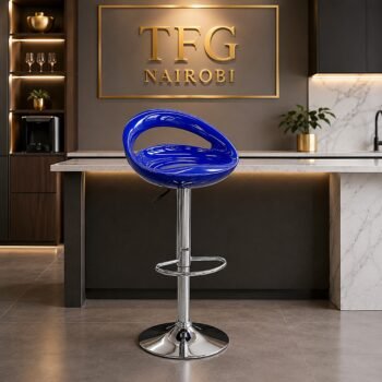 PMBS800-1 blue bar stool with a chrome pedestal base staged next to a modern kitchen island under the TFG Nairobi logo.