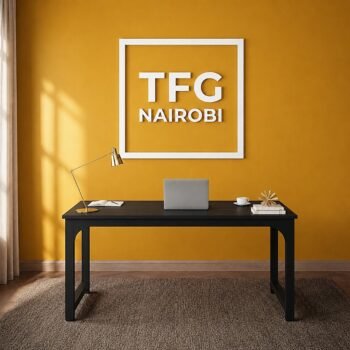 TFG VM1.6M black computer table with metallic frame in a modern workspace on Gatundu Road, Nairobi, Kenya