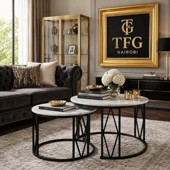 X19 marble nesting tables staged in a modern living room on Othaya Road, Nairobi, Kenya – light‑coloured marble tabletops with gold‑finish legs for luxury living spaces.