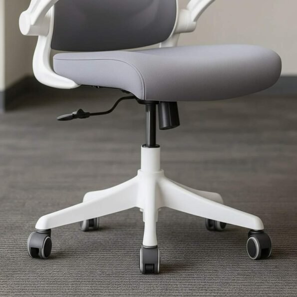 Close-up of black and grey caster wheels on OFC800 heavy-duty high-back office chair base, ensuring smooth 360° mobility on carpet or hard floors for stable office workstations.