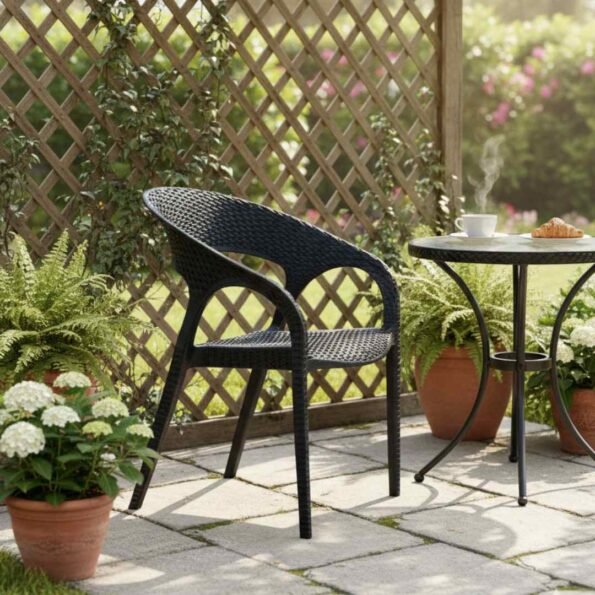 MJ500 plastic chair black Nairobi – side view on outdoor patio