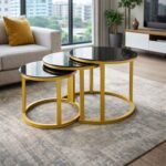 1+80 glass top nesting tables with gold metal frames and black tempered glass in a Kilimani living room