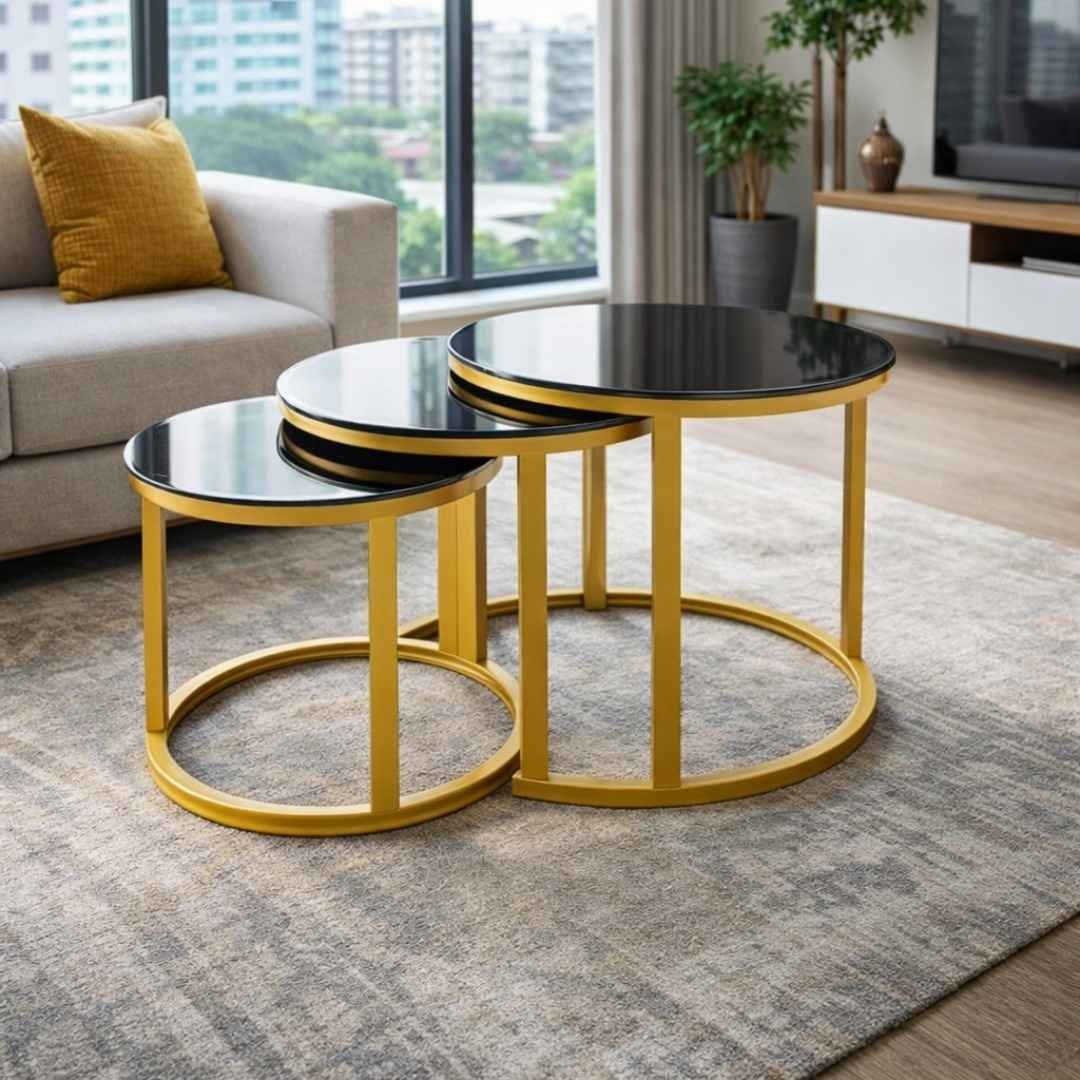 1+80 Gold and Black Glass Nesting Tables - TFG Nairobi 1+80 glass top nesting tables with gold metal frames and black tempered glass in a Kilimani living room