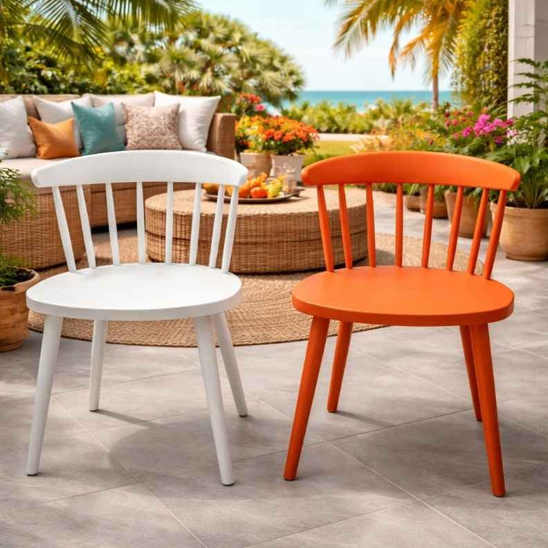 TWAF822 Nordic Plastic Chair Patio Set – TFG Nairobi Pair of TWAF822 Nordic plastic chairs in orange and white on a modern patio in Loresho, Nairobi.