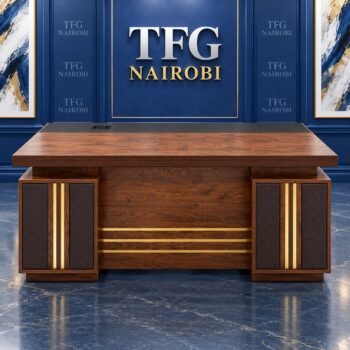 1.4M Executive Wooden Desk with Charcoal Pad & Gold Trim Kenya staged in a luxury blue showroom in Kitisuru Nairobi
