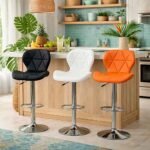 Trio of TWAFBS1700 bar stools in black, white, and orange featuring diamond tufted leather in a modern Kilimani, Nairobi kitchen.