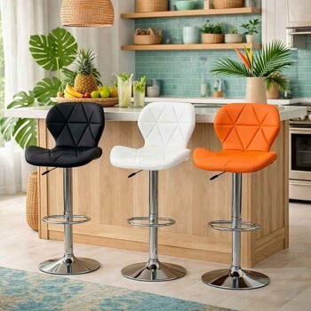Trio of TWAFBS1700 bar stools in black, white, and orange featuring diamond tufted leather in a modern Kilimani, Nairobi kitchen.