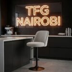 JH177-4 Bar Stool, modern grey bar stool with backrest and matte black base staged in a Kilimani Nairobi luxury kitchen.