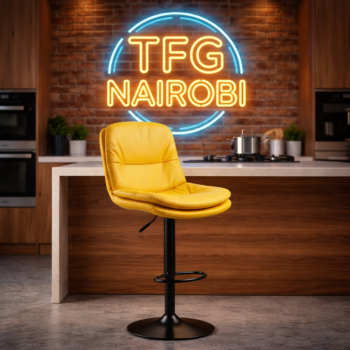 Premium yellow leather adjustable JH296-1 bar stool with swivel base and backrest in a modern kitchen setting at Mua Park Road, Muthaiga, Nairobi.