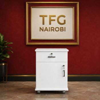 A sleek TFG UD500-1 white under desk cabinet built with premium 18mm MDF standing in a luxury Hurlingham home office under a gold TFG NAIROBI sign.