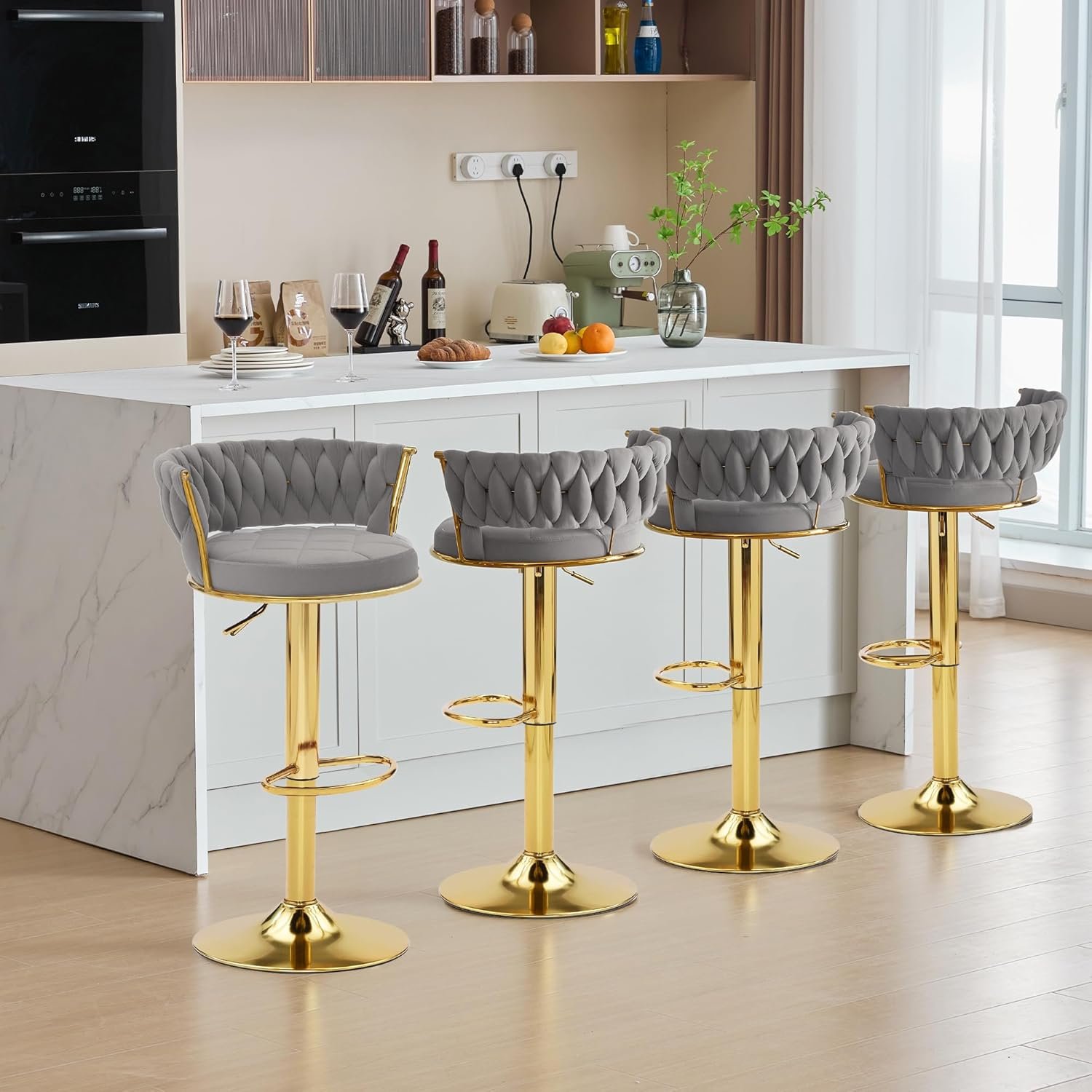 VC12G Bar Stool - Amboseli Road Luxury Kitchen Island Setup Four VC12G grey velvet and gold swivel bar stools by VECELO STORE lined up along a luxury white marble kitchen island on Amboseli Road.