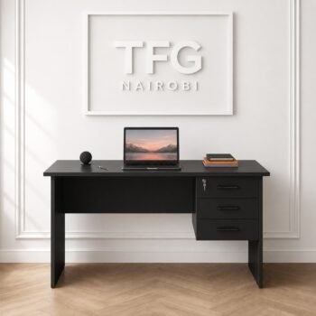 The premium 1.4m Black Executive Desk Nairobi by TFG Nairobi with three lockable drawers set against a clean white wood-paneled wall on Muthithi Road, Westlands.