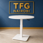 White 70cm height adjustable round table with manual crank and pedestal base in Westlands Nairobi by TFG Nairobi