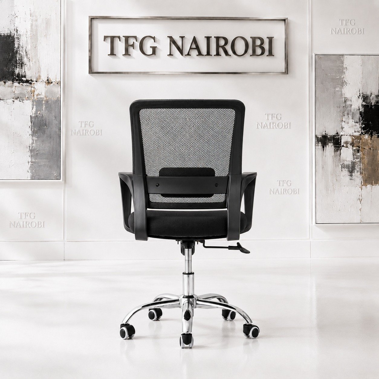 Low-Back Office Chair Black Back View - Kitisuru Nairobi Back view of low-back office chair in black showing mesh backrest and lumbar support