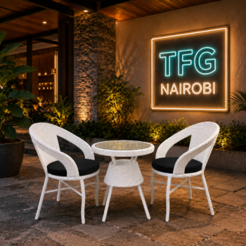 3 piece white PE rattan outdoor patio bistro set with black cushions round glass top table and 2 curved armchairs in Kilimani Nairobi by TFG Nairobi