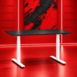 Electric Height Adjustable Desk 160x60cm Res Novae PDBW8001 with matte black top, white motorized steel T-leg base, and digital LED controller staged along Kiambu Road, Nairobi