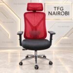 Red Ergonomic Mesh Office Chair with headrest, Y-frame spine support silhouette, black cushion, and chrome base by TFG Nairobi in Westlands