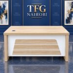 1.4M Oak Wood Executive Office Desk with 3-Drawer Pedestal Kenya staged in a luxury blue showroom in Kitisuru Nairobi