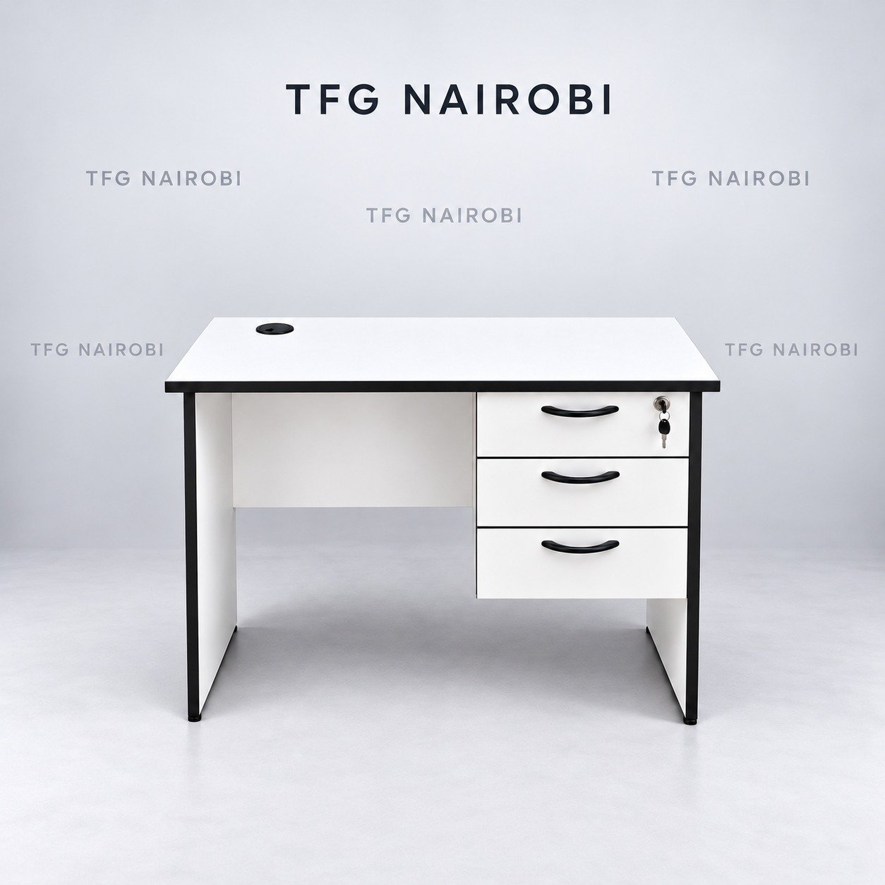 Compact Office Desk with Drawers Kenya – 100cm White Compact office desk with drawers Kenya – 100cm white desk with 3 lockable drawers, cable grommet and black accent trim, Northlands, Nairobi